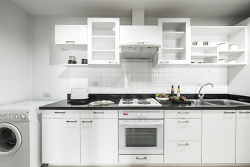 Modern kitchen interior with electric and microwave oven