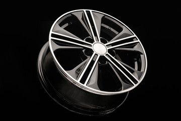 black alloy wheel on dark background close up