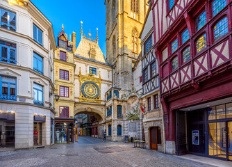 The Gros-Horloge (Great-Clock) is a fourteenth-century astronomical clock in Rouen, Normandy, France. Architecture and landmarks of Rouen. Cozy cityscape of Rouen - obrazy, fototapety, plakaty
