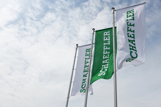 Ingolstadt, Bavaria / Germany - May 20, 2018:  Flags with the logo of Schaeffler AG in Ingolstadt, Germany - Schaeffler Group is a manufacturer of rolling element bearings for automotive