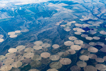 Aerial view of crop circles and crop squares from Idaho near the snake river. Circle shaped fields and square shaped fields