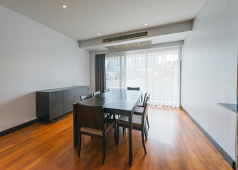 Stylish kitchen interior with dining table and chairs
