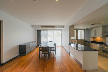 Stylish kitchen interior with dining table and chairs