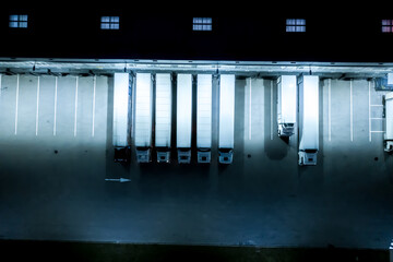 Night Loading dock at a warehouse. modern logistics center. docking stations of a distribution...