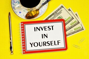 Invest in yourself-text inscription on the planning notebook. placement of capital for the purpose of obtaining financial profit or knowledge in education.