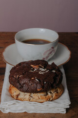  large cookies with cup of coffee