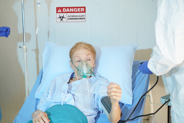 covid 19 coronavirus disease control experts and doctor treating infected patient serious cases...