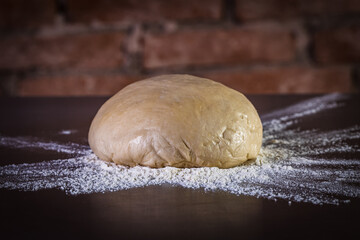 Fresh raw dough for pizza ready to be prepared