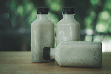 Mix of various nuts smoothie in plastic bottle