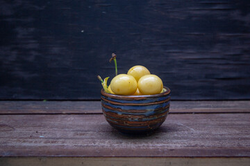 delicious yellow cherries in a bowl