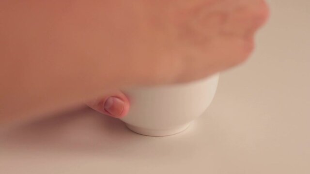 Beating eggs in a small bowl