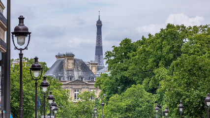 Paris, France - June 8, 2020: Eiffel tower and Haussmann building viewed from Pantheon monument in Paris