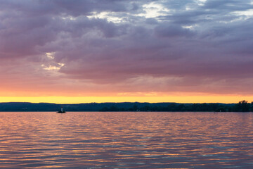 Fototapeta na wymiar Rich Magenta sunset on water