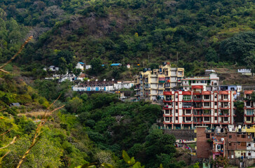 Fototapeta premium wide photography of buildings and mounatins in the background