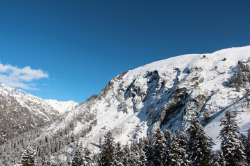 Mountain landscape of snowy Dombay