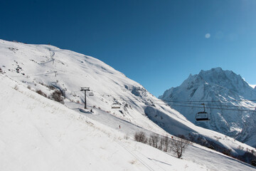 Fototapeta na wymiar Mountain landscape of snowy Dombay