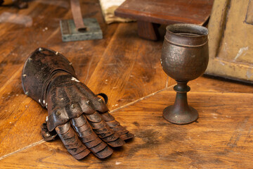 old bronze knight glove and glass