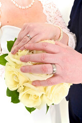 Obraz na płótnie Canvas bride and groom ring shot with flowers