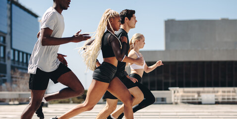 Street runners running in the city