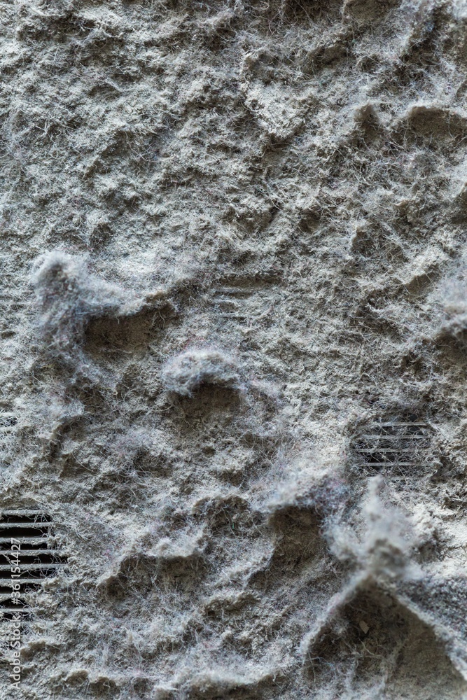 Poster vertical top angle shot of a dirty and dusty heatsink on a computer processor - socket 775 cooler