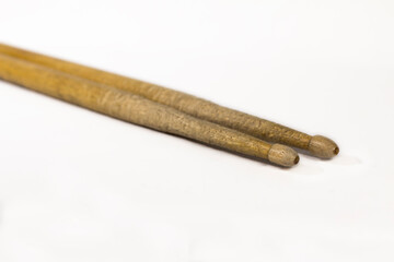 a pair of drum sticks / isolated white background
