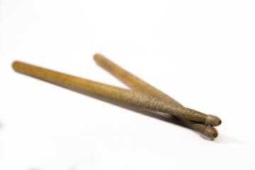 a pair of drum sticks / isolated white background