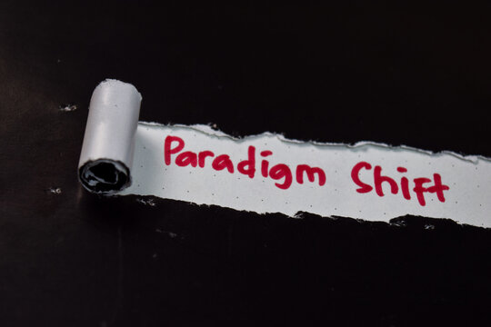 Paradigm Shift Text written in torn paper