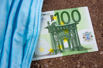One hundred euros and a medical mask. Covid-19
