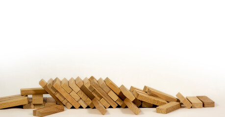 Fallen wooden game blocks, scattered on ground