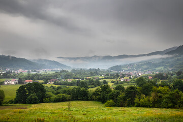 Obraz premium Beautiful hills and meadows on Zlatibor mountain in Serbia at the morning