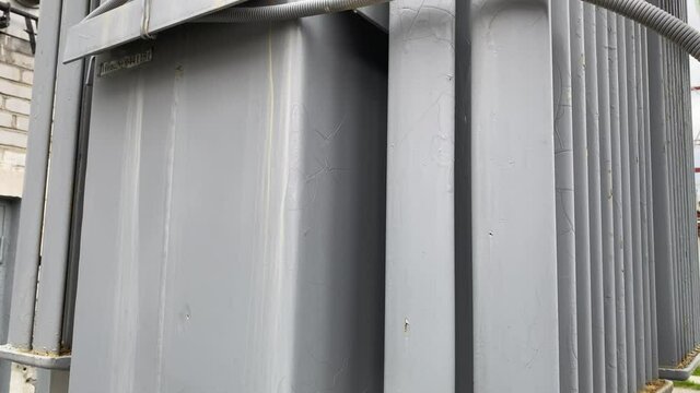 Power step-down transformers at an AC distribution substation