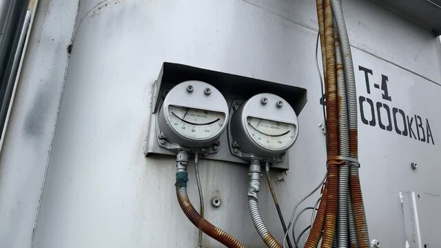 Power step-down transformers at an AC distribution substation