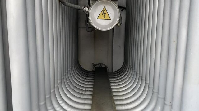 Power step-down transformers at an AC distribution substation