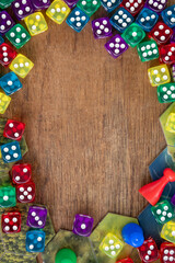top view of colorful dices on wooden background