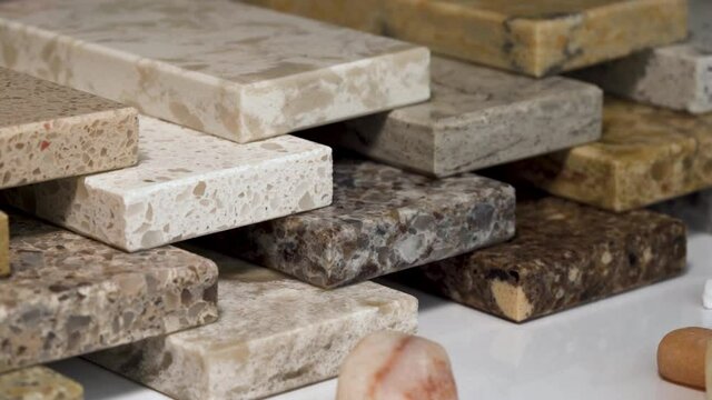 Kitchen countertops made of granite, marble and quartz slabs. Color samples of stone counters.