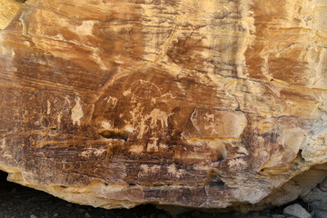 Ancient Native American Indian rock art petroglyph cave Utah 1404. Nine Mile Canyon, Utah. World’s longest art gallery of ancient native American, Indian rock art, hieroglyphs, pictographs.