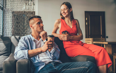 Loving couple looking at each other chilling in cafe