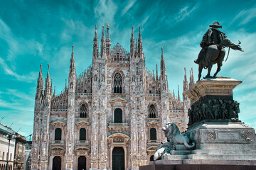 Naklejka na ściany i meble Duomo di Milano (Milan Cathedral) in Italy. Milan Cathedral is the largest church in Italy and the third largest in the world and It is a famous tourist attraction of Milan