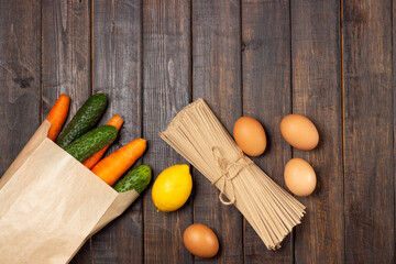 Food stock. Vegetables, eggs and pasta. Food delivery and donation service. Copy space