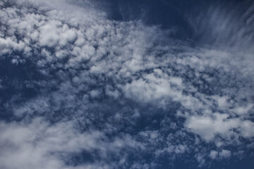Obraz premium Clouds on the blue sky. Background, texture.