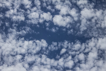 Clouds on the blue sky. Background, texture.