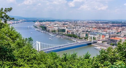 Fototapeta na wymiar A view of the River Danube in Budapest from the Gellert Hill above the Elizabeth Bridge in the summertime
