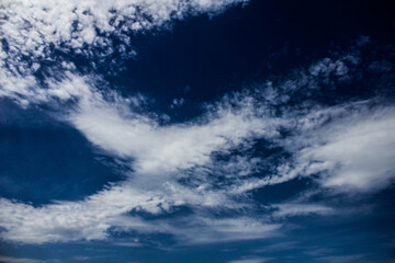 Fototapeta na wymiar Clouds on the blue sky. Background, texture.