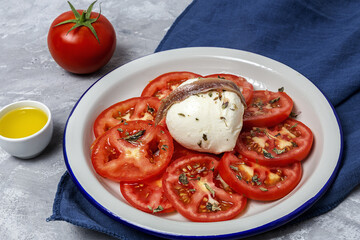 Healthy Homemade Tomato Salad with Mozzarella, Anchovies and Oregano