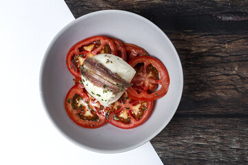 Healthy Homemade Tomato Salad with Mozzarella, Anchovies and Oregano