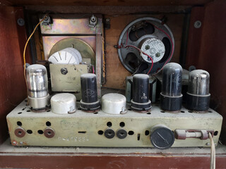 Inside the old tube receiver with speaker. Side view.