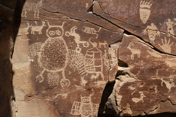 Native American Indian rock art petroglyph owl panel 1409. Nine Mile Canyon, Utah. World’s longest art gallery of ancient native American, Indian rock art, hieroglyphs, pictographs.