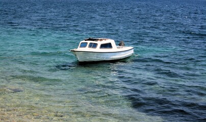 white boat on a blue sea, Orebic, Croatia