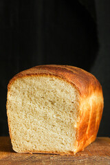 wheaten bread white wholegrain golden fresh baking. food background top view copy space for text