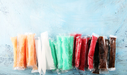Colorful frozen fruit bar ice pops. Frozen Popsicles